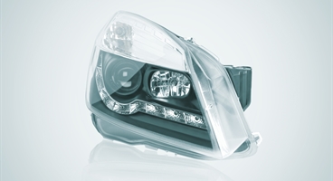 Automotive headlight. The image has been retouched according to the PLASTINUM imagery. This image is another version of ID 78246 (different format and colour gradient in the background).